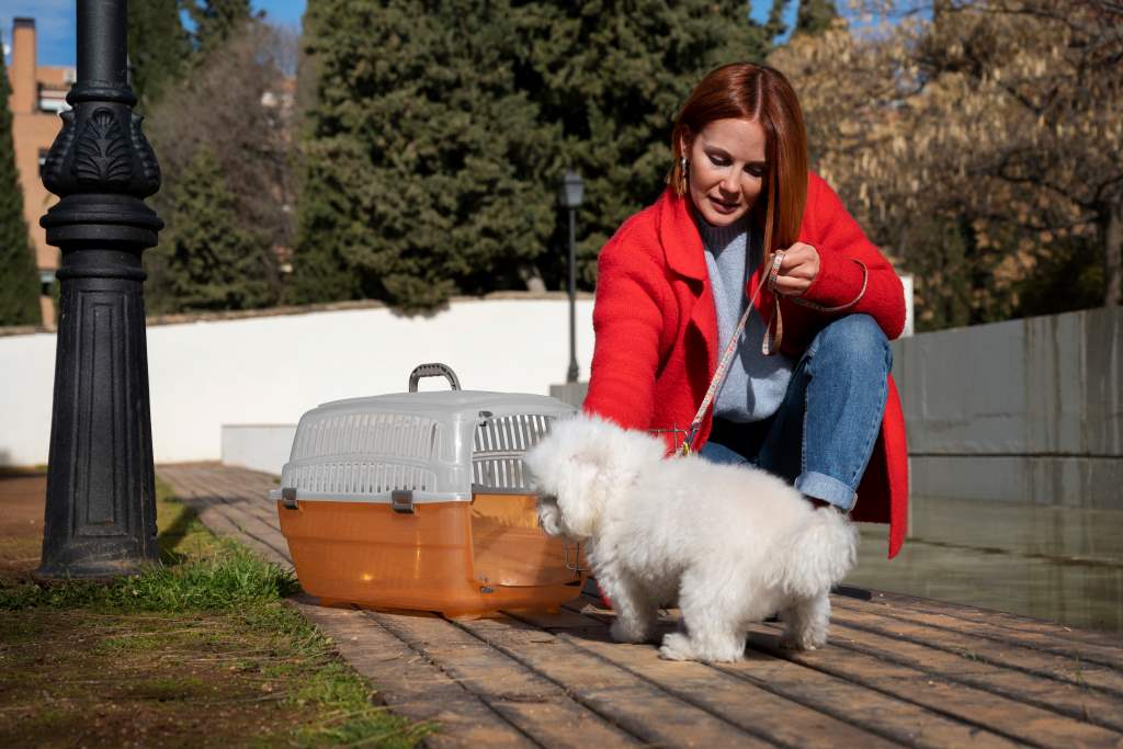 woman with pet carrier